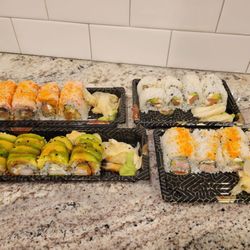 Okinawa Hibachi Sushi Ramen - Top left clockwise: River, Philly, California, Caterpillar rolls