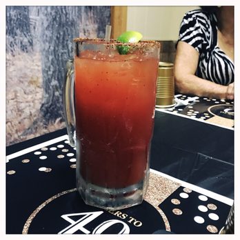 Plaza Tapatio - a bloody drink with a lime garnish - Mexican Near Me - Pleasanton, Texas Plaza Tapatio - a bloody drink with a lime garnish - Mexican Near Me - Pleasanton, Texas