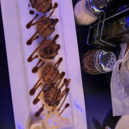 Yum yum yummy!!! Great evening. Fun bar these are the stuffed mushrooms. So so good!! Yum yum yummy!!! Great evening. Fun bar these are the stuffed mushrooms. So so good!!