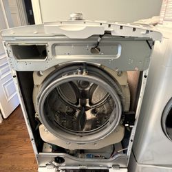 Replacing and testing the drain pump on a LG washer to fix error codes.