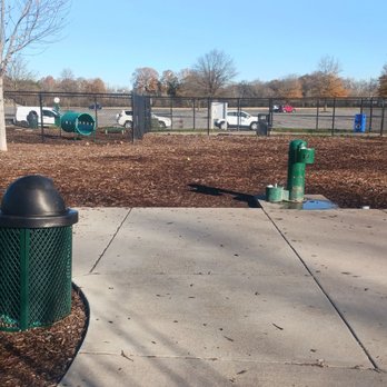 The Bark Park - Nice water feature and empty book bag dispenser? Which may explain the biological landmines - Dog Parks Near Me The Bark Park - Nice water feature and empty book bag dispenser? Which may explain the biological landmines - Dog Parks Near Me