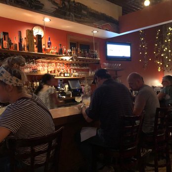 Santa Fe - a group of people sitting at a bar - Mexican Near Me - Glen Ellyn, Illinois Santa Fe - a group of people sitting at a bar - Mexican Near Me - Glen Ellyn, Illinois