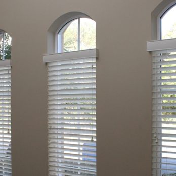 Advantage Blinds - 2" Faux wood blind.  In this pic we have left the arch above open for light while covering the bottom for privacy! - Shades & Blinds Near Me