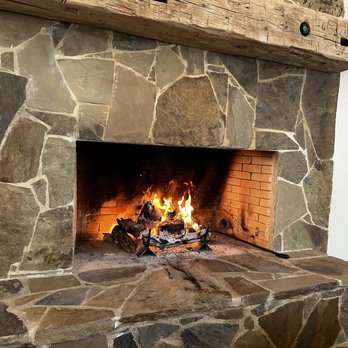 Tasting Room at The Vine - Cozy fire on a chilly day. - Wine Tasting Room Near Me - New Ulm, Texas Tasting Room at The Vine - Cozy fire on a chilly day. - Wine Tasting Room Near Me - New Ulm, Texas