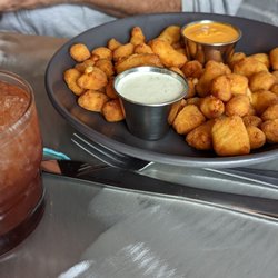 Cheese Curds appetizer and an Old Fashion cocktail