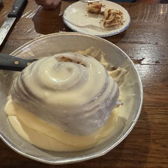 Five Oaks Farm Kitchen - Cinnamon roll as big as a pie plate! So yummy. Lots of icing. - Breakfast & Brunch Near Me - Sevierville, Tennessee Five Oaks Farm Kitchen - Cinnamon roll as big as a pie plate! So yummy. Lots of icing. - Breakfast & Brunch Near Me - Sevierville, Tennessee