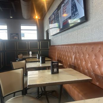 District Bar and Kitchen - Interior seating - Burgers Near Me - Ocala, Florida District Bar and Kitchen - Interior seating - Burgers Near Me - Ocala, Florida