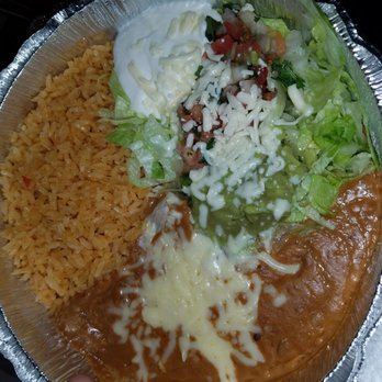 Fiesta Ranchera Mexican - Accompaniments rice, pintos sour cream guac salad - Mexican Near Me - Adrian, Michigan