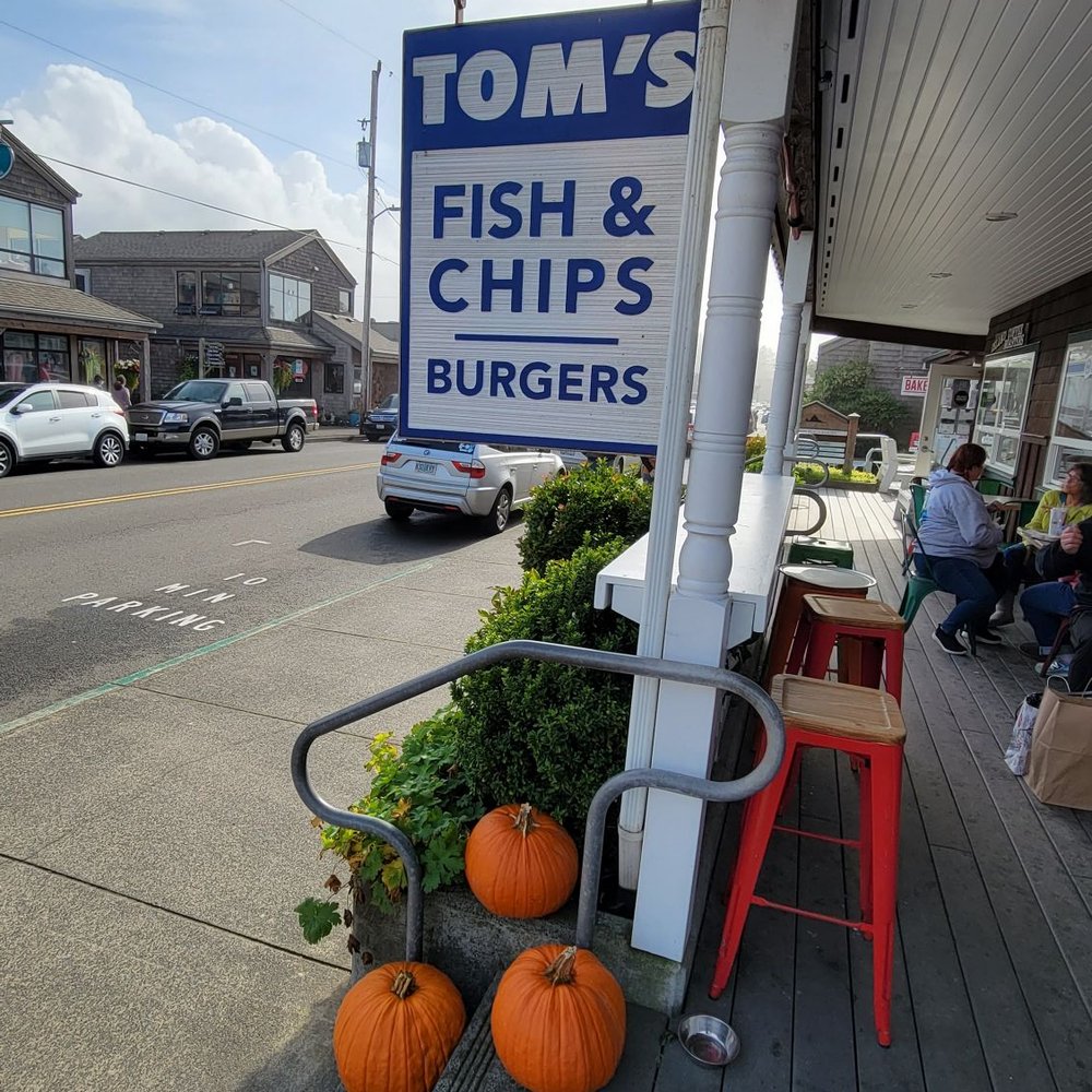 Tom's Fish N Chips - Outside view - Burgers Near Me - Cannon Beach, Oregon Tom's Fish N Chips - Outside view - Burgers Near Me - Cannon Beach, Oregon