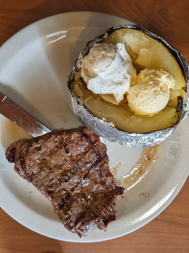 Ponderosa Steak House Logo