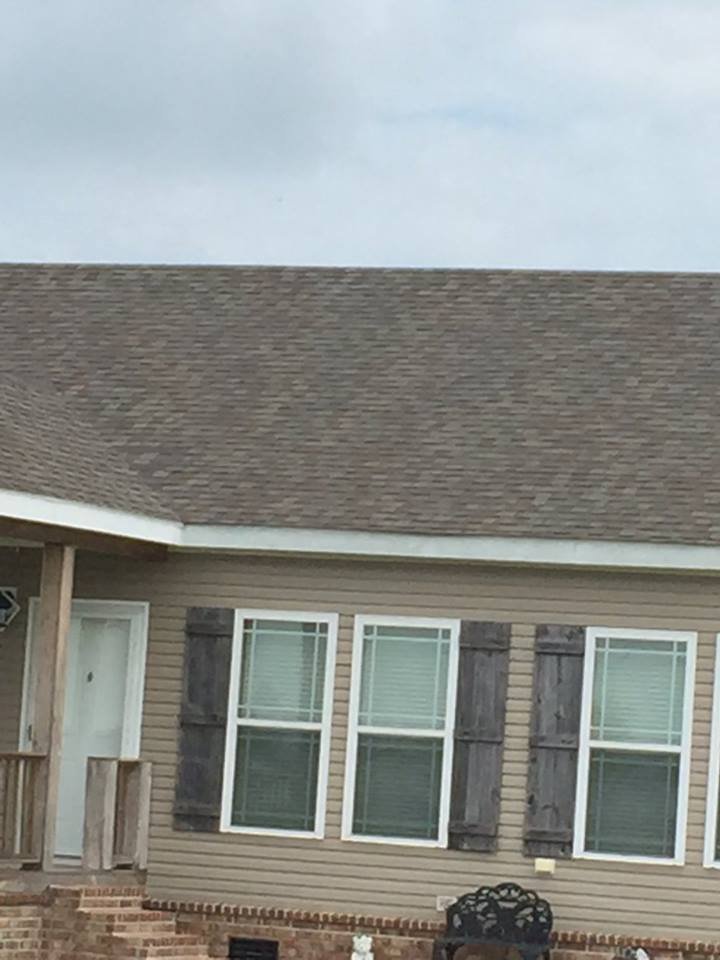 Slide of John Theriots Roofing