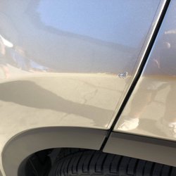 QuikPark LAX - Although a small ding, it's still costly to repair on a luxury SUV
