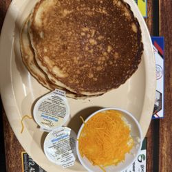 Poor Boy - Pancakes(huge), and cheese grits.