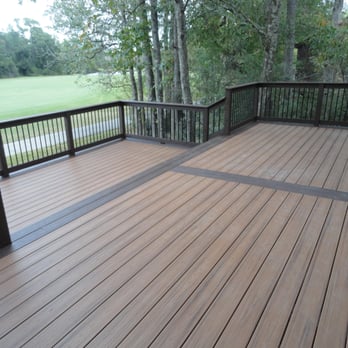 Woody WoodDeckers - Trex "Tiki Torch" Deck with "Lava Rock" Border. - General Contractors Near Me Woody WoodDeckers - Trex "Tiki Torch" Deck with "Lava Rock" Border. - General Contractors Near Me