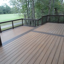 Woody WoodDeckers - Trex "Tiki Torch" Deck with "Lava Rock" Border.