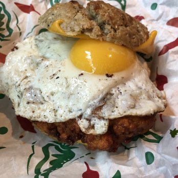 The Toasted Coconut - Honey butter chicken biscuit with a fried egg - New American Near Me - Houston, Texas The Toasted Coconut - Honey butter chicken biscuit with a fried egg - New American Near Me - Houston, Texas