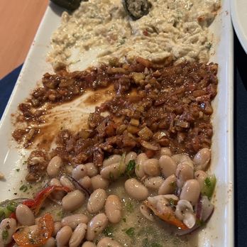 Sevin Mediterranean Kitchen - Mixed Cold Plate (after we had already dug into it a bit): hummus with dolma (stuffed grape leaves), babaganoush, ezme, and piyaz. - Turkish Near Me - San Antonio, Texas Sevin Mediterranean Kitchen - Mixed Cold Plate (after we had already dug into it a bit): hummus with dolma (stuffed grape leaves), babaganoush, ezme, and piyaz. - Turkish Near Me - San Antonio, Texas