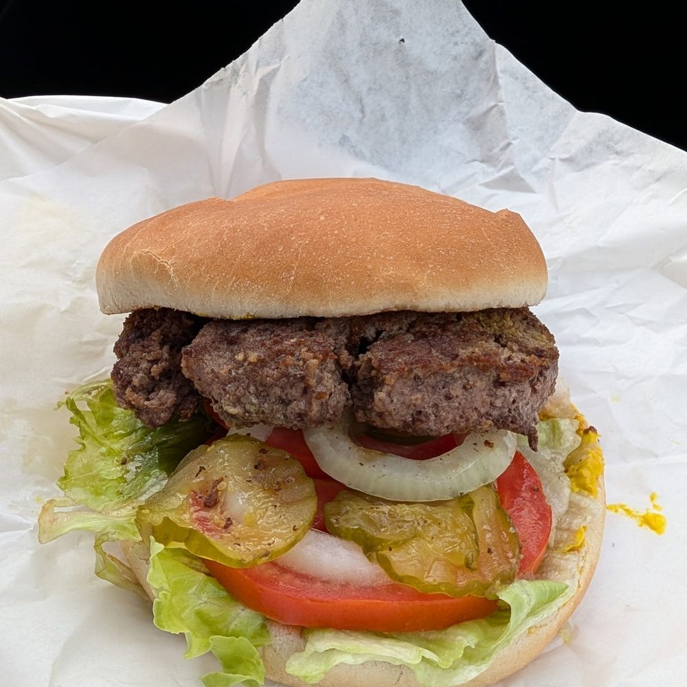 Hruska's - Hamburger with lettuce, tomato, pickles, onions, and mustard - Bakeries Near Me - Ellinger, Texas
