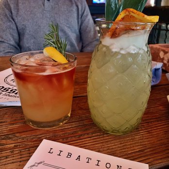 Bosscat Kitchen & Libations - L to R: The Bosscat ($14.00) and Pineapple Sage Elixir ($12.00) - New American Near Me - Irvine, California