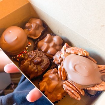 Springdale Candy Company - a hand holding a box of chocolates - Candy Stores Near Me - Springdale, Utah Springdale Candy Company - a hand holding a box of chocolates - Candy Stores Near Me - Springdale, Utah