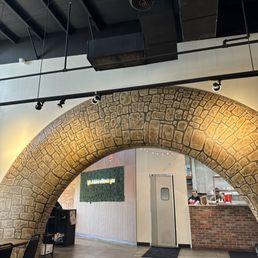 Stone arch painted by artist Sarah Rasul (and another artist who had to finish the last part due to illness! Sorry I don't know your name!).