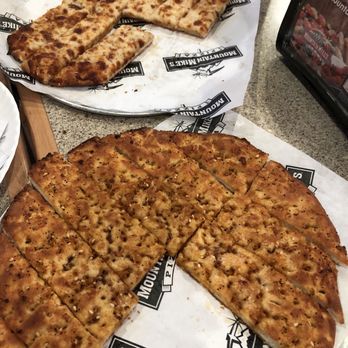 Mountain Mike's Pizza - Cheese bread and Garlic bread. Delicious! If I were to choose one Id choose the garlic bread as I wait for my pizza - Pizza Near Me - Vallejo, California Mountain Mike's Pizza - Cheese bread and Garlic bread. Delicious! If I were to choose one Id choose the garlic bread as I wait for my pizza - Pizza Near Me - Vallejo, California