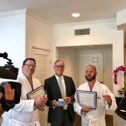 Paul Turek, MD, FACS, FRSM - Dr. Turek with his Brosectomy patients following their procedures--with signed certificates of achievement from Dr. Turek himself!