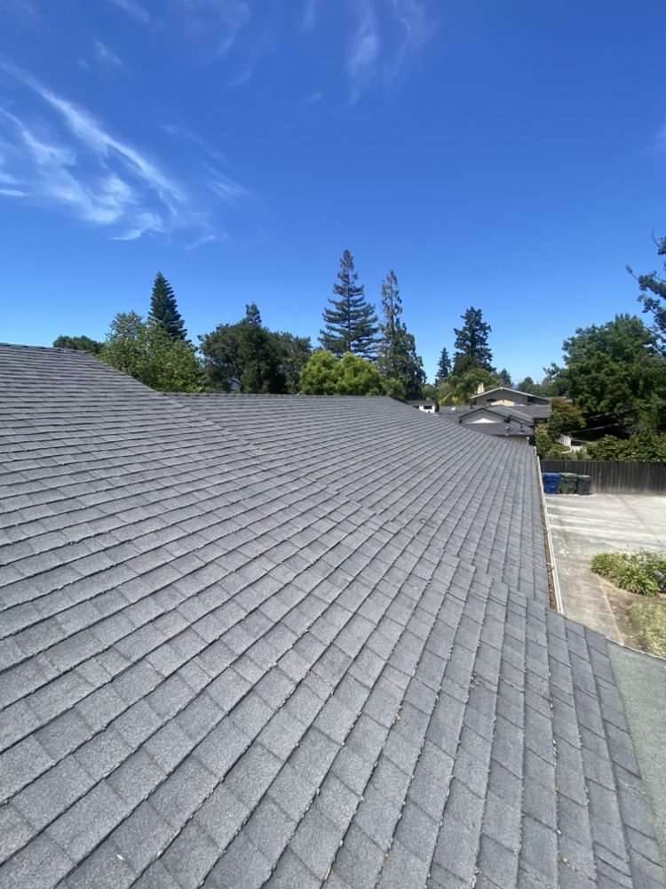 Slide of Tip Top Roofing