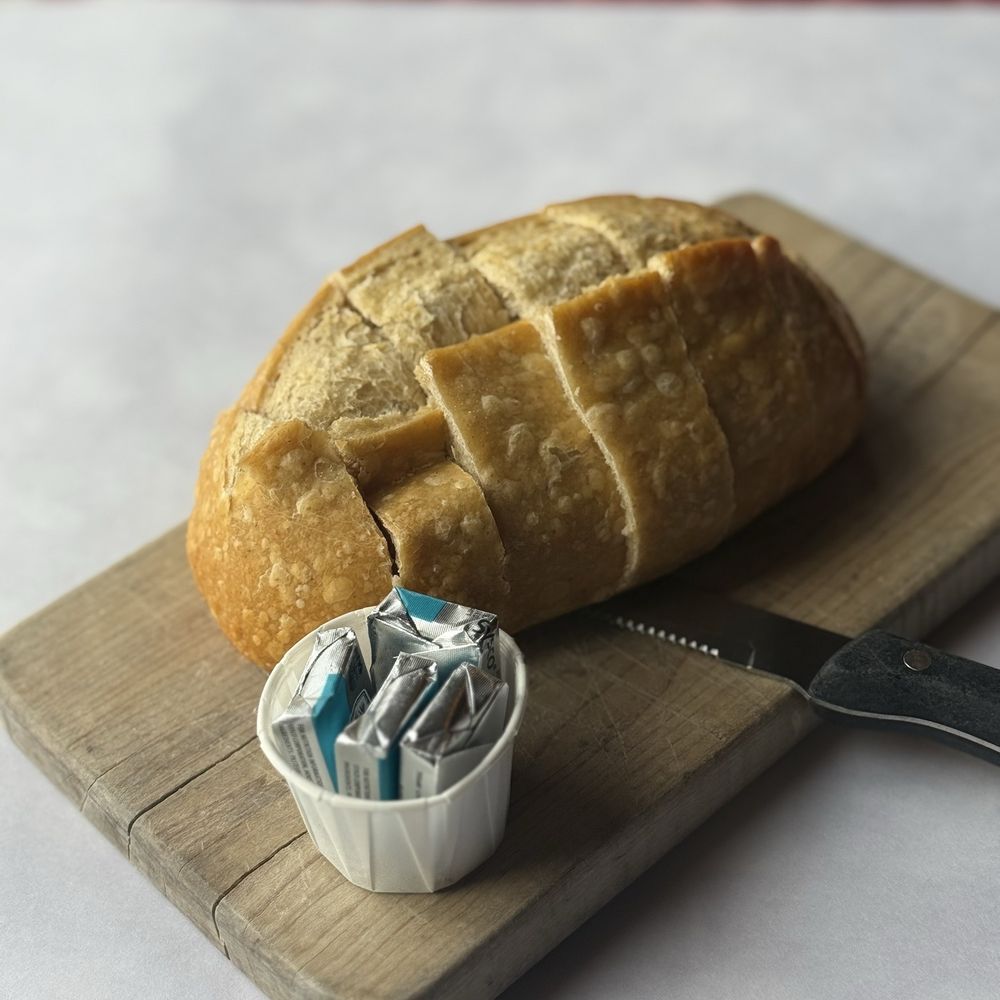 The Crab Pot Bellevue - Sourdough Loaf & Butter (IG: @eatwithbaobae) - Seafood Near Me - Bellevue, Washington The Crab Pot Bellevue - Sourdough Loaf & Butter (IG: @eatwithbaobae) - Seafood Near Me - Bellevue, Washington