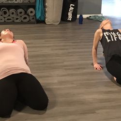 Carlsbad Yoga Barre - Two people doing a class