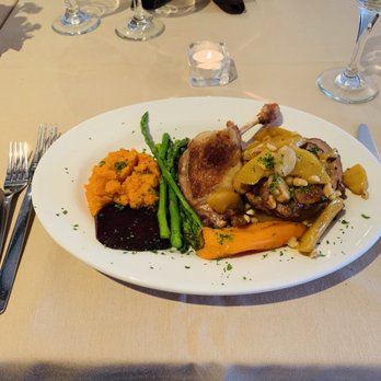 Amelia - Pan seared duck sautéed with moscato wine, peaches, hazel nuts & roasted garlic. Side of fresh vegetables - Italian Near Me - New Hope, Pennsylvania Amelia - Pan seared duck sautéed with moscato wine, peaches, hazel nuts & roasted garlic. Side of fresh vegetables - Italian Near Me - New Hope, Pennsylvania