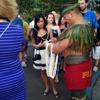Chief's Luau - Giving out shell necklaces - Performing Arts Near Me - Kapolei, Hawaii Chief's Luau - Giving out shell necklaces - Performing Arts Near Me - Kapolei, Hawaii