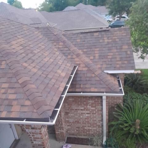 Slide of Urbina Roofing