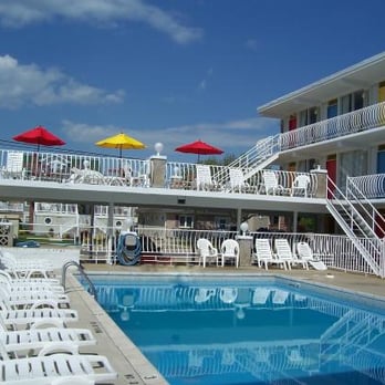 Lollipop Motel - Another side of the pool and the sundeck! It was an absolute gorgeous day!! - Hotels Near Me - Wildwood, New Jersey Lollipop Motel - Another side of the pool and the sundeck! It was an absolute gorgeous day!! - Hotels Near Me - Wildwood, New Jersey