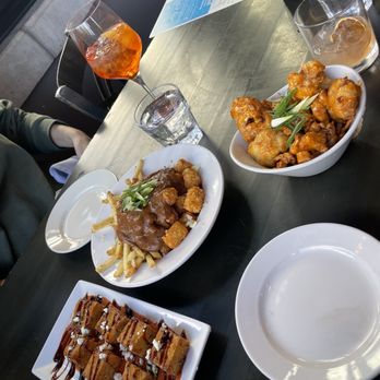 The Roost - Polenta bites, poutine, cauliflower & happy hour drinks! - Bars Near Me - Longmont, Colorado The Roost - Polenta bites, poutine, cauliflower & happy hour drinks! - Bars Near Me - Longmont, Colorado