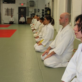 Sendokan Dojo - Line up sitting seiza (kneeling) ready for class to begin - Martial Arts Near Me - Mississasuga, Ontario Sendokan Dojo - Line up sitting seiza (kneeling) ready for class to begin - Martial Arts Near Me - Mississasuga, Ontario