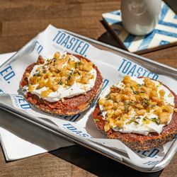 TOASTED. Bagels & Coffee - Date & Labneh on Poppy Bagel