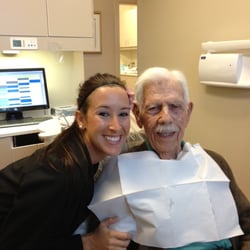 Compass Dental - Mr. Leon with his favorite dental assistant Tiffany and his new smile. Mr. Leon is the oldest member of the Savannah Golf Club.