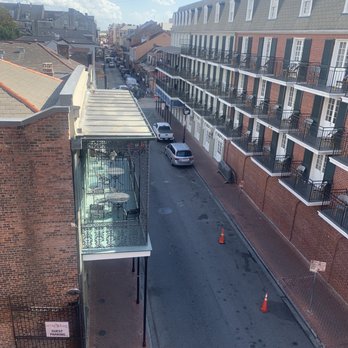 Hotel St Marie - 4.th floor balcony view looking towards Bourbon St - Hotels Near Me - New Orleans, Louisiana Hotel St Marie - 4.th floor balcony view looking towards Bourbon St - Hotels Near Me - New Orleans, Louisiana