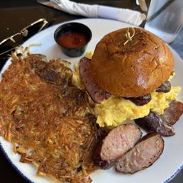Breakfast sandwich with turkey bacon and hash browns Breakfast sandwich with turkey bacon and hash browns