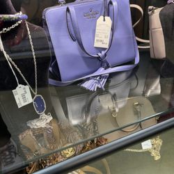 Consigned By Design - Several cases of jewelry