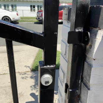 Diverse Welding, Pipe Welding and Ironworks - After Diverse Welding fixed gate. He added lock and handle to pull gate open and close. - Metal Fabricators Near Me Diverse Welding, Pipe Welding and Ironworks - After Diverse Welding fixed gate. He added lock and handle to pull gate open and close. - Metal Fabricators Near Me