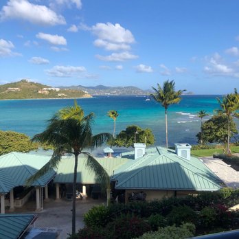 The Ritz-Carlton, St. Thomas - View of bar and beach from balcony - Hotels Near Me - St. Thomas, Virgin Islands