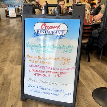 Capri Restaurant - Meridian - a menu board - American Near Me - Meridian, Idaho