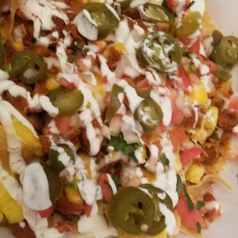 El Patron Mexican Grill - Nachos with al pastor pork. Very good, though the pineppe is a bit strange on nachos - Mexican Near Me - Catonsville, Maryland