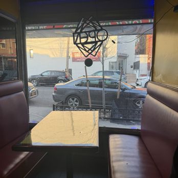 Richie Rich Carribean - Middle window seat. - Caribbean Near Me - Bronx, New York Richie Rich Carribean - Middle window seat. - Caribbean Near Me - Bronx, New York