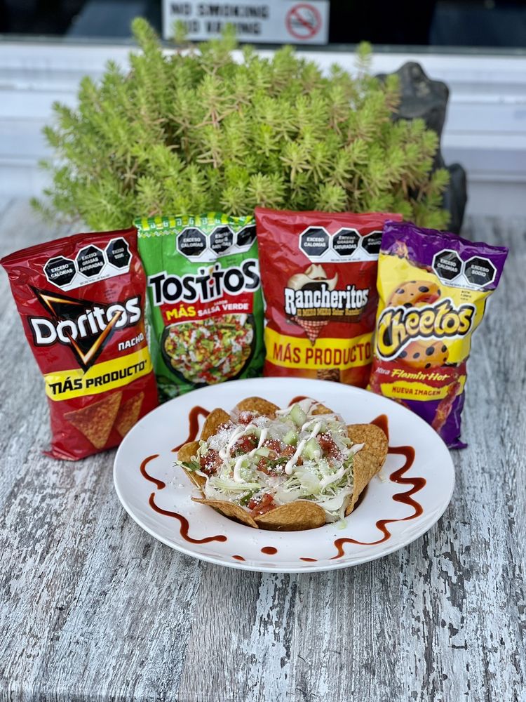 La Esquinita De Oro Logo