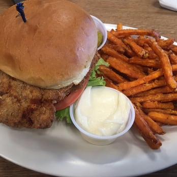 Rick's Cafe - Chicken fried chicken sandwich with a side of sweet potato fries - Diners Near Me - Virginia Beach, Virginia