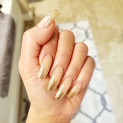 Gelax Nails And Spa - Deep French with metallic gold, stones on thumb