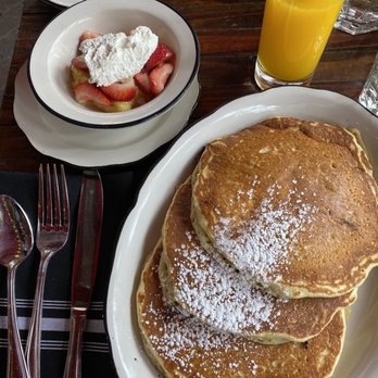 Park Tavern - Chocolate chip pancakes and seasonal fruit with lemon curd! Very good! Also seemed like the orange juice was freshly squeezed! - New American Near Me - Delray Beach, Florida Park Tavern - Chocolate chip pancakes and seasonal fruit with lemon curd! Very good! Also seemed like the orange juice was freshly squeezed! - New American Near Me - Delray Beach, Florida